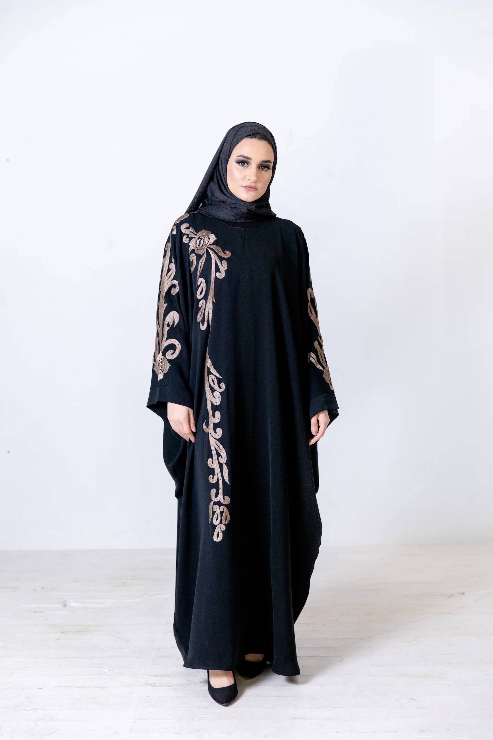 Black Closed Abaya – Luxurious Batwing Design with Gold Front and Sleeve Embroidery