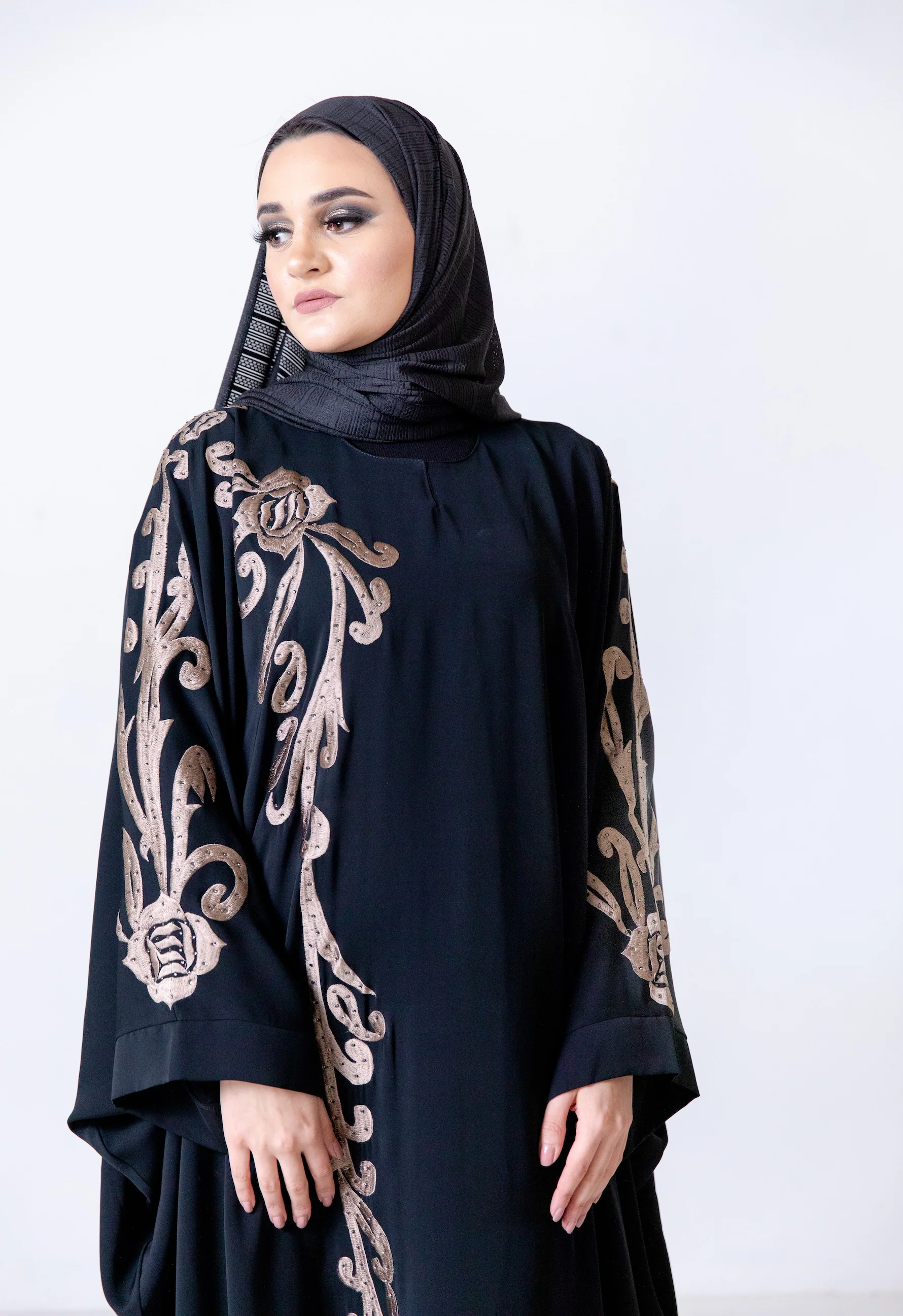 Black Closed Abaya – Luxurious Batwing Design with Gold Front and Sleeve Embroidery - Image 4