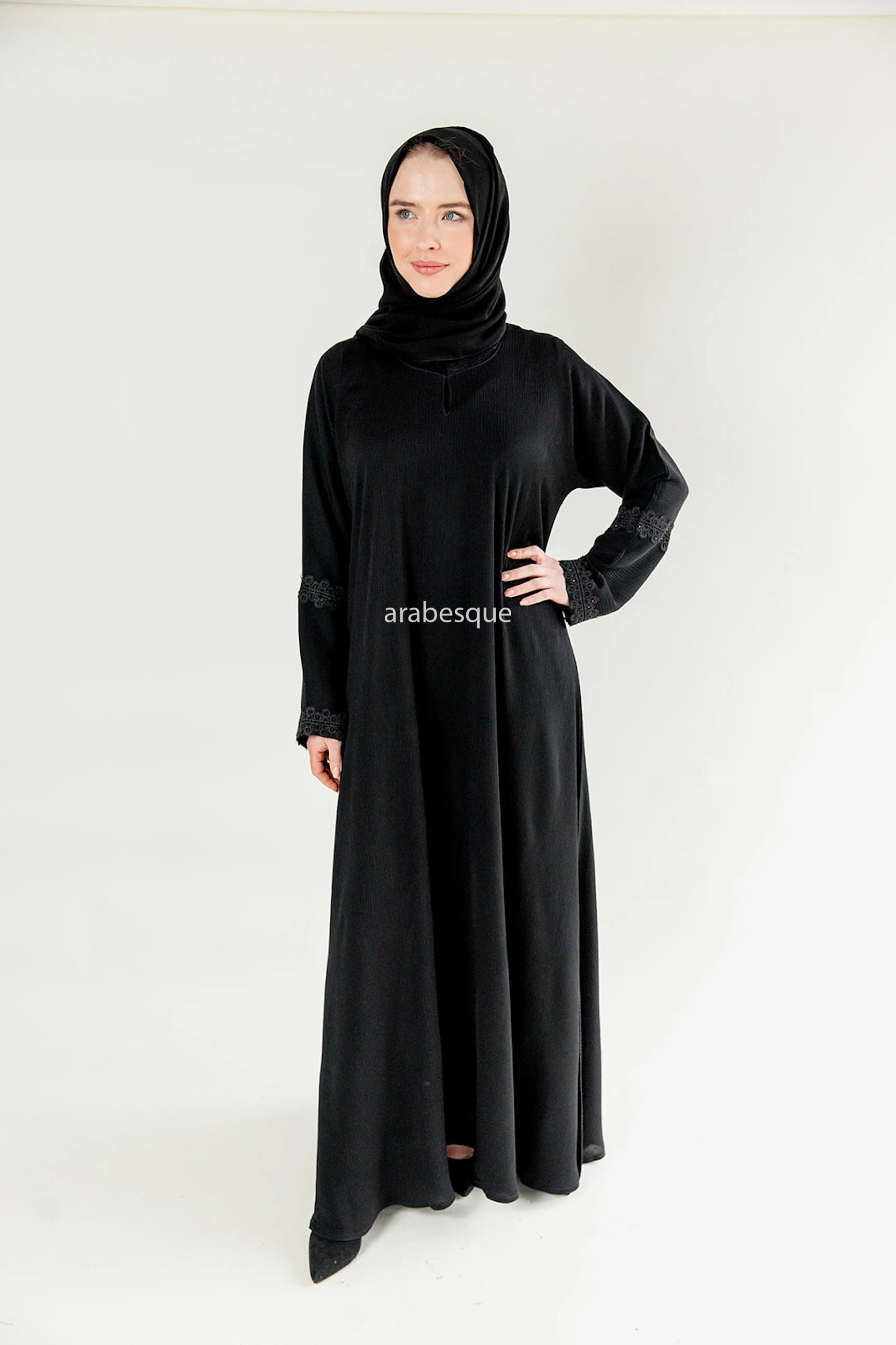 Black Closed Abaya – Textured Umbrella Cut Design with Lace Detail
